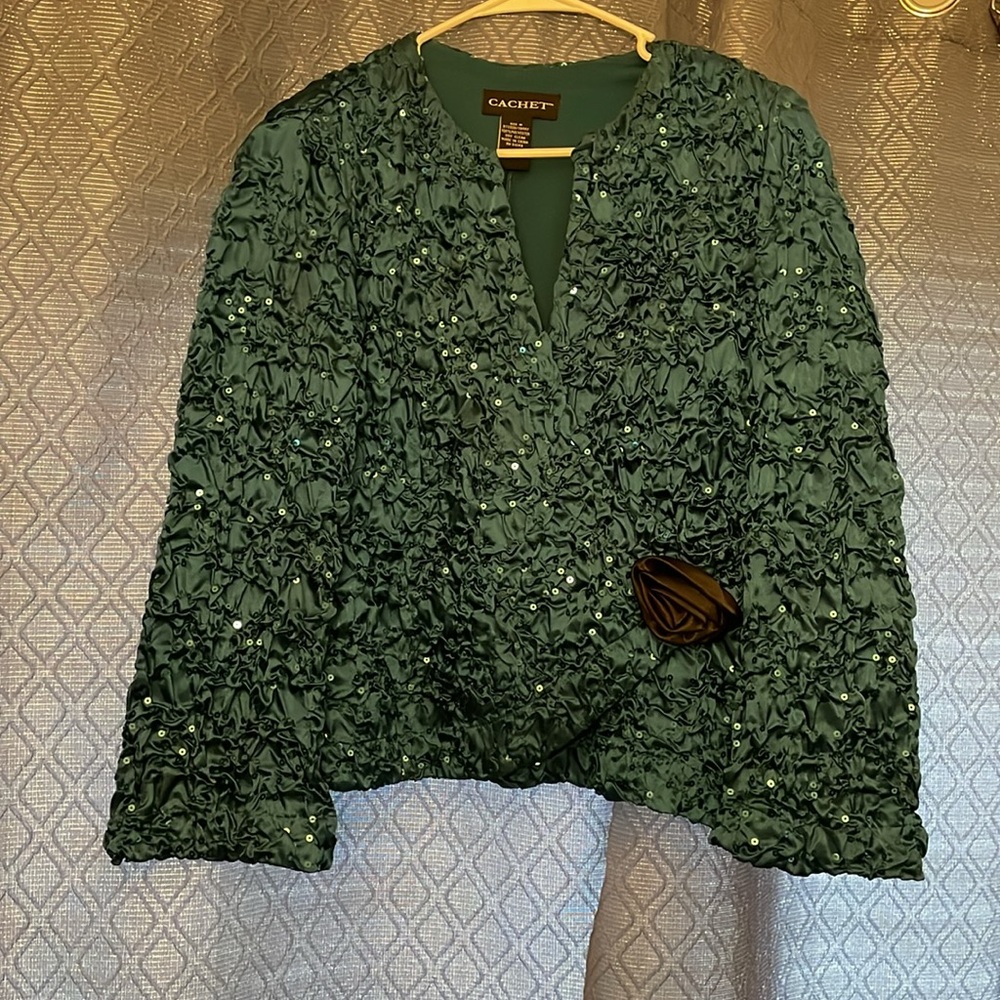 Vintage- Blouse Teal w/ Sequins
Crepe Fabric- Dry Clean Only
Size-Med
Good Cond.